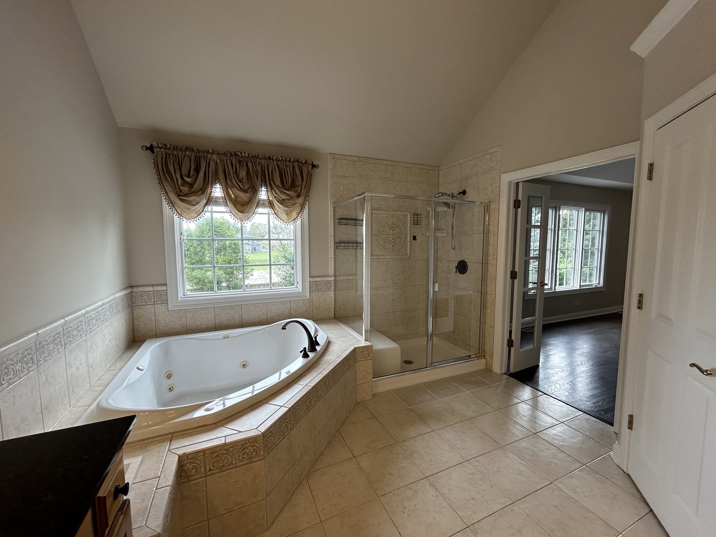 3932 Bluejay Lane Naperville, IL 60564 - Photo 26 of 50 a bathroom with a bathtub and a shower
