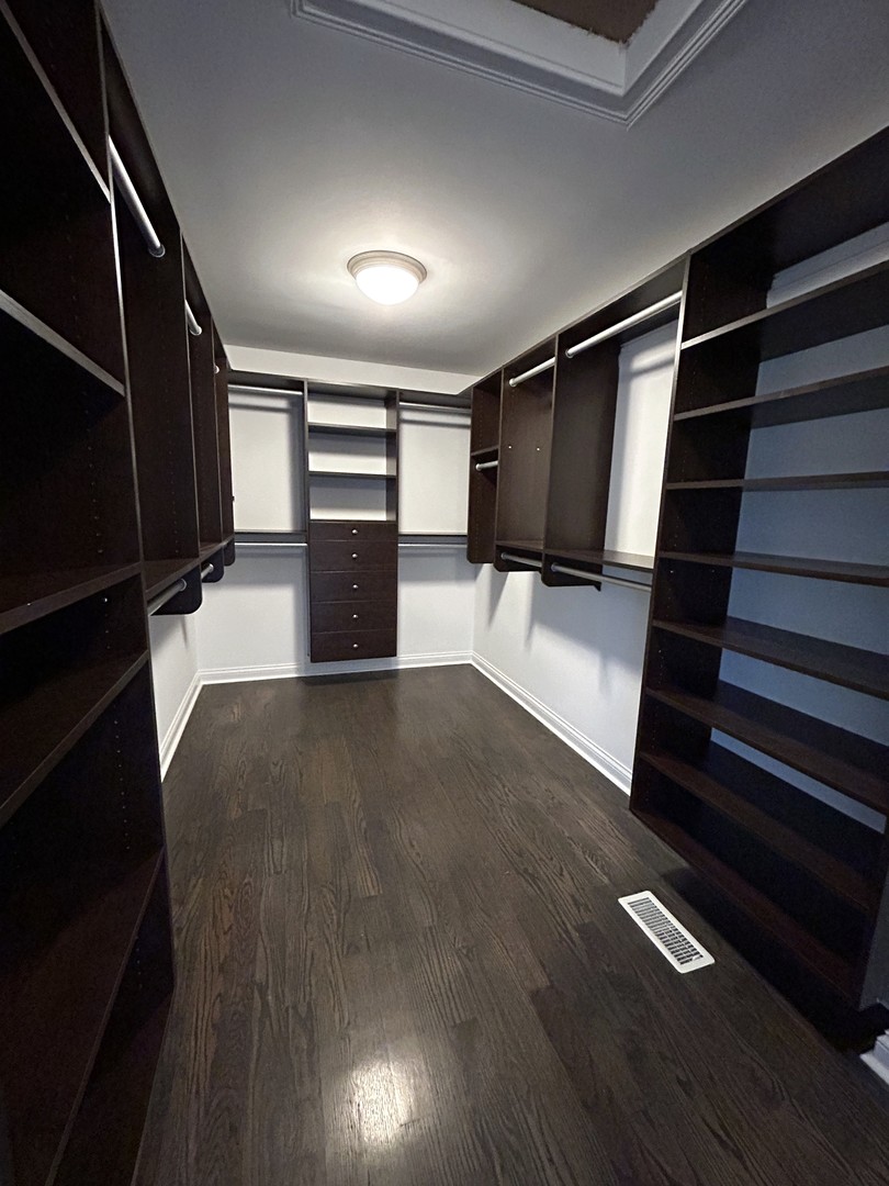 3932 Bluejay Lane Naperville, IL 60564 - Photo 29 of 50 a view of an empty room with stairs and furniture