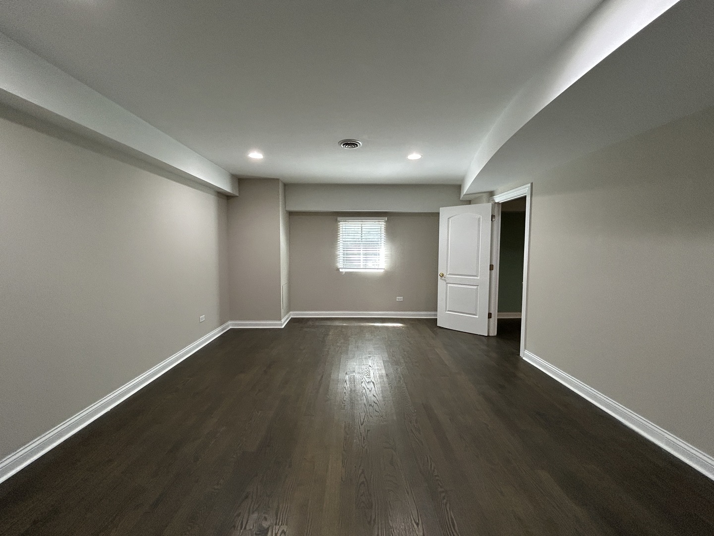 3932 Bluejay Lane Naperville, IL 60564 - Photo 41 of 50 an empty room with wooden floor and window