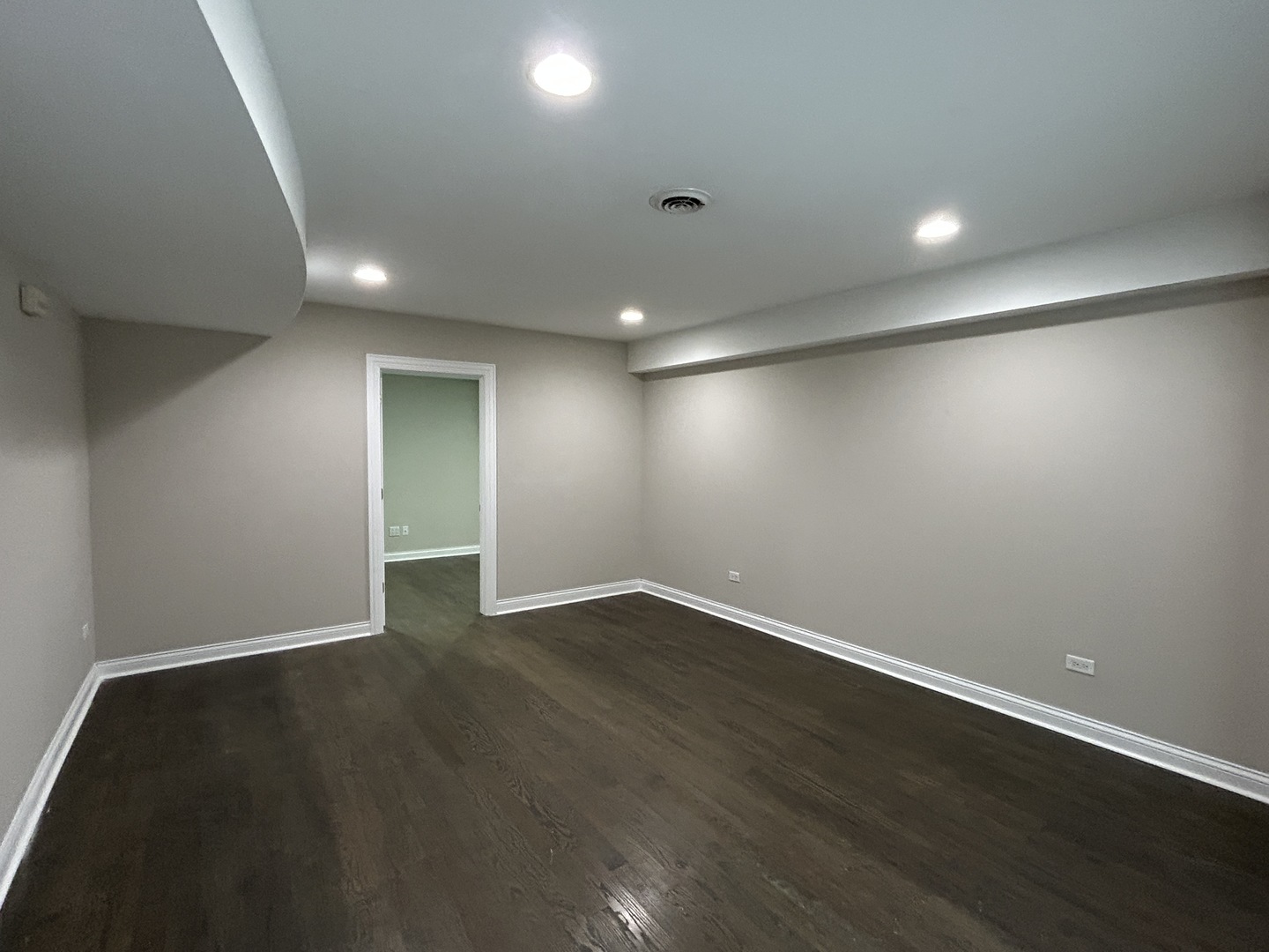 3932 Bluejay Lane Naperville, IL 60564 - Photo 44 of 50 an empty room with wooden floor and windows