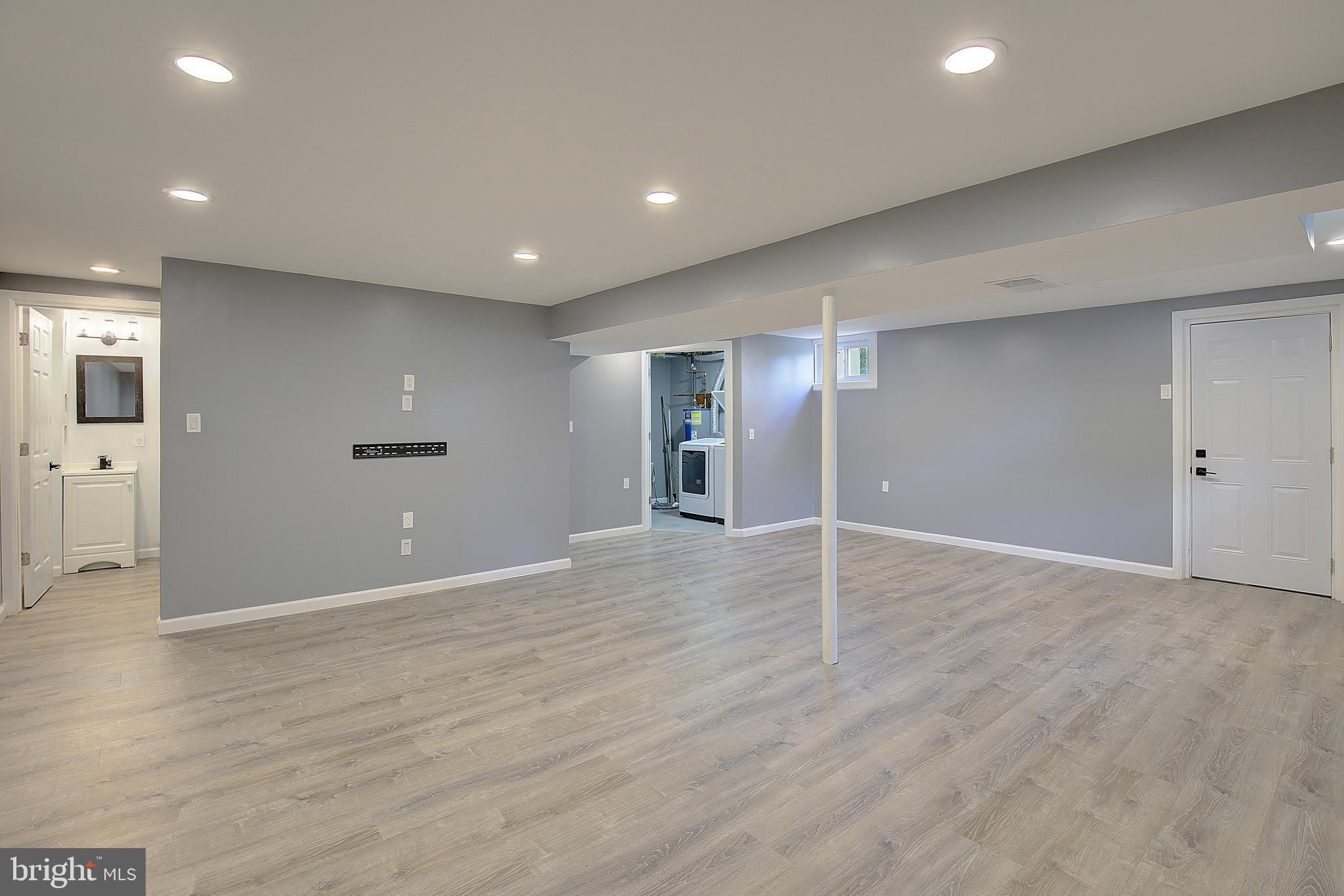 11611 Whittier Road Bowie, MD 20721 - Photo 35 of 39 Recreation Room - with attached utility room