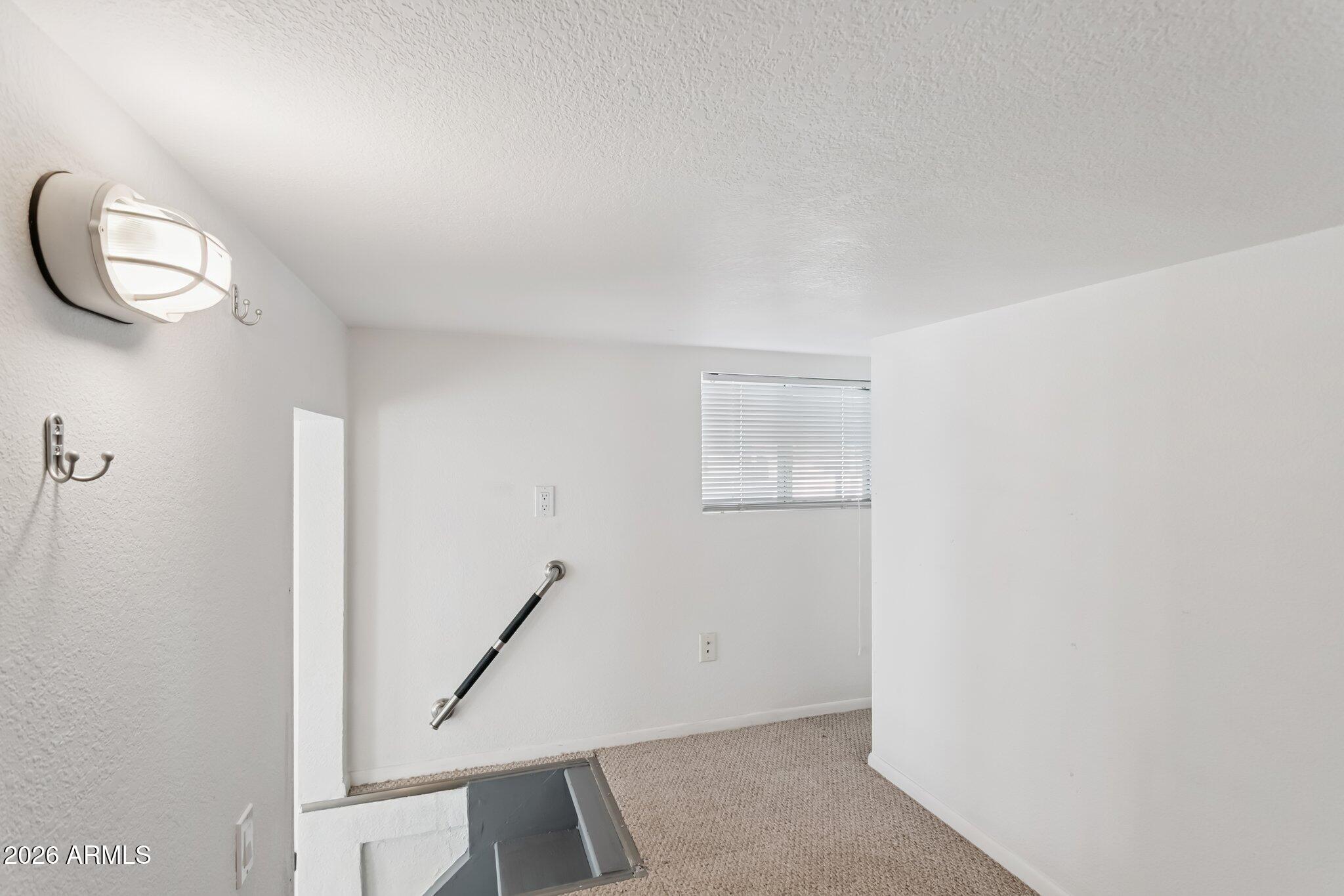 17200 West Bell Road, Unit 869 Surprise, AZ 85374 - Photo 12 of 25 a view of an empty room