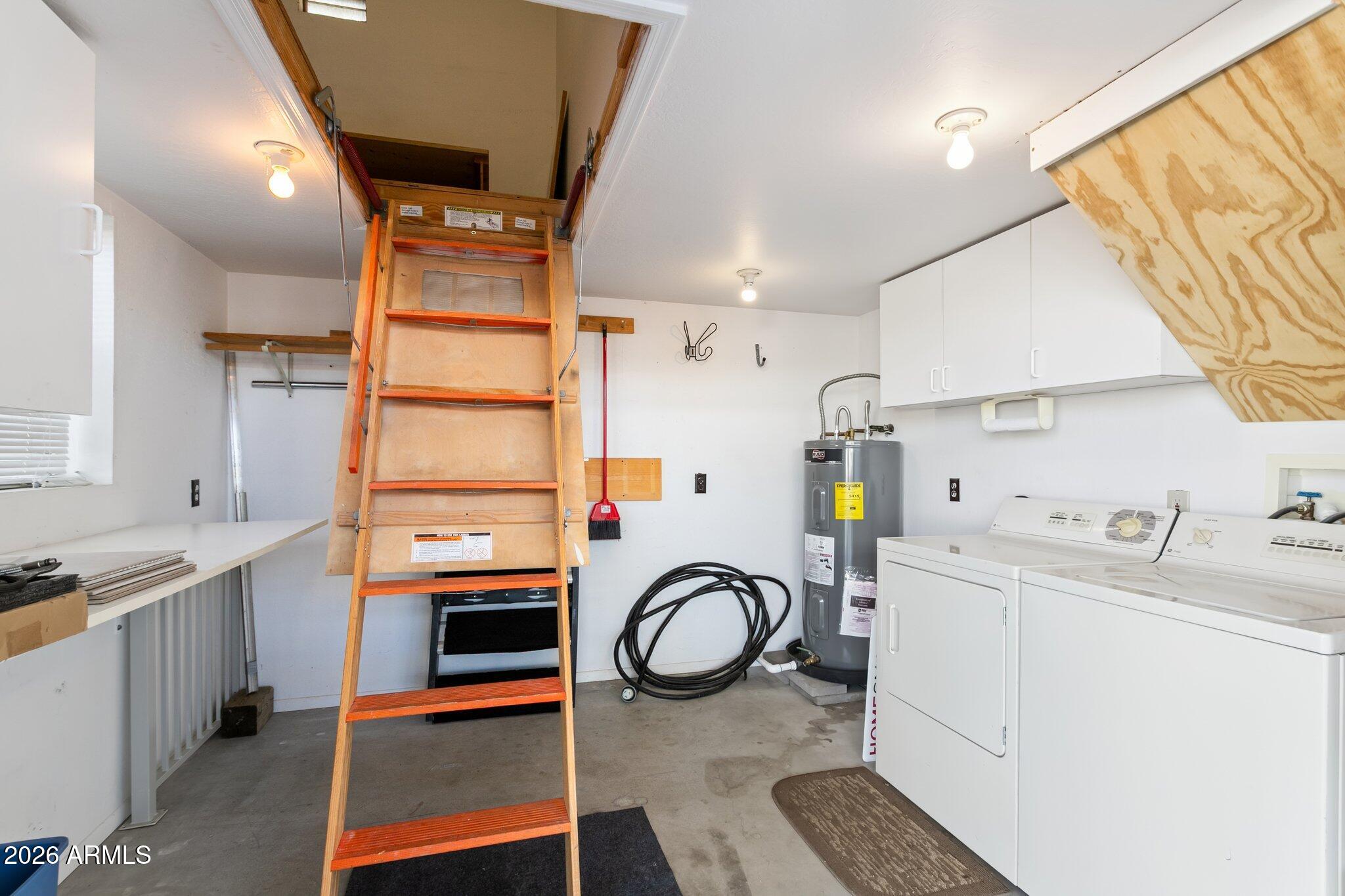 17200 West Bell Road, Unit 869 Surprise, AZ 85374 - Photo 22 of 25 a kitchen with granite countertop a stove a sink and a refrigerator