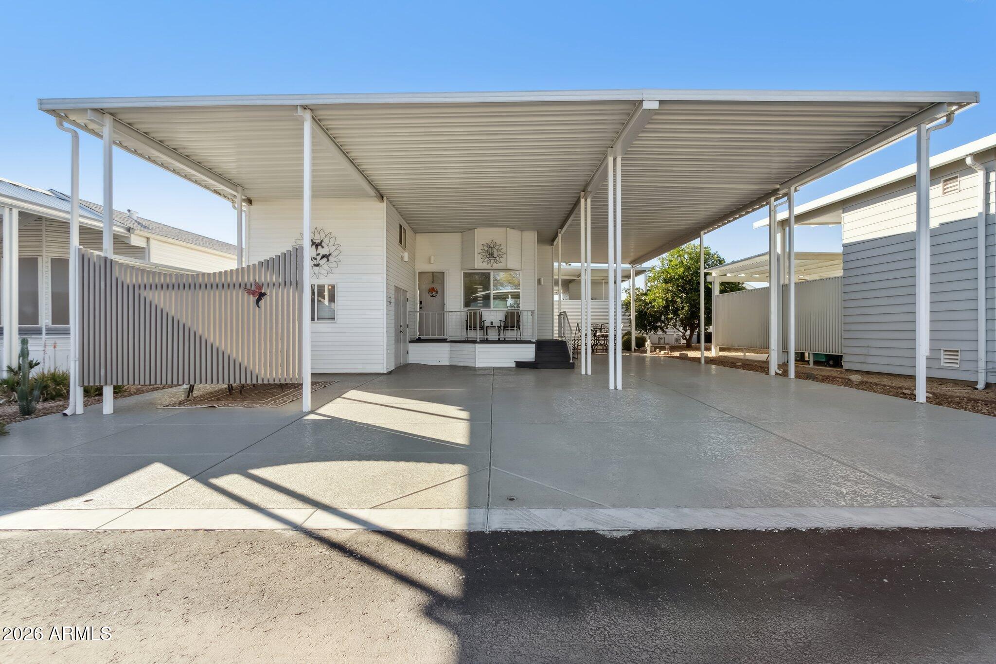 17200 West Bell Road, Unit 869 Surprise, AZ 85374 - Photo 2 of 25 a view of a house with a patio