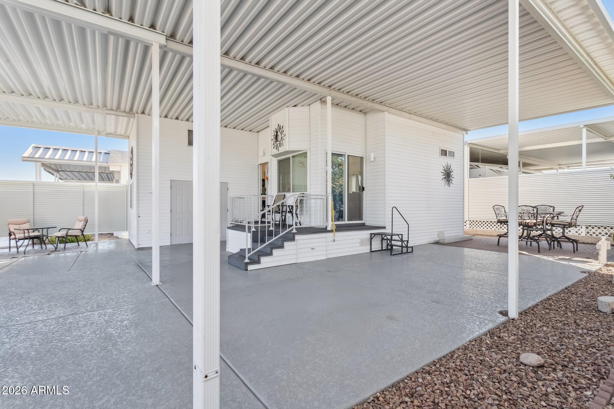 17200 West Bell Road, Unit 869 Surprise, AZ 85374 - Photo 4 of 25 a view of a living room and livingroom with furniture