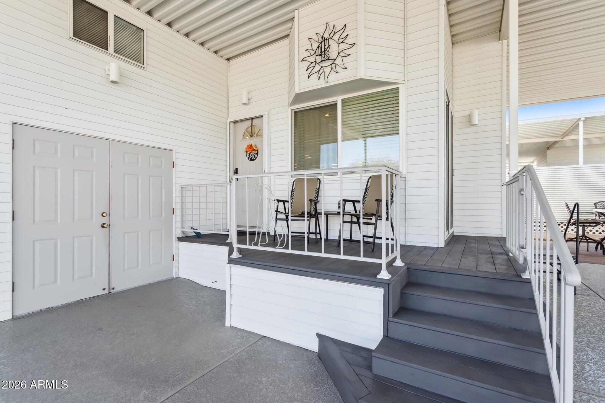 17200 West Bell Road, Unit 869 Surprise, AZ 85374 - Photo 8 of 25 a view of staircase with white walls and windows