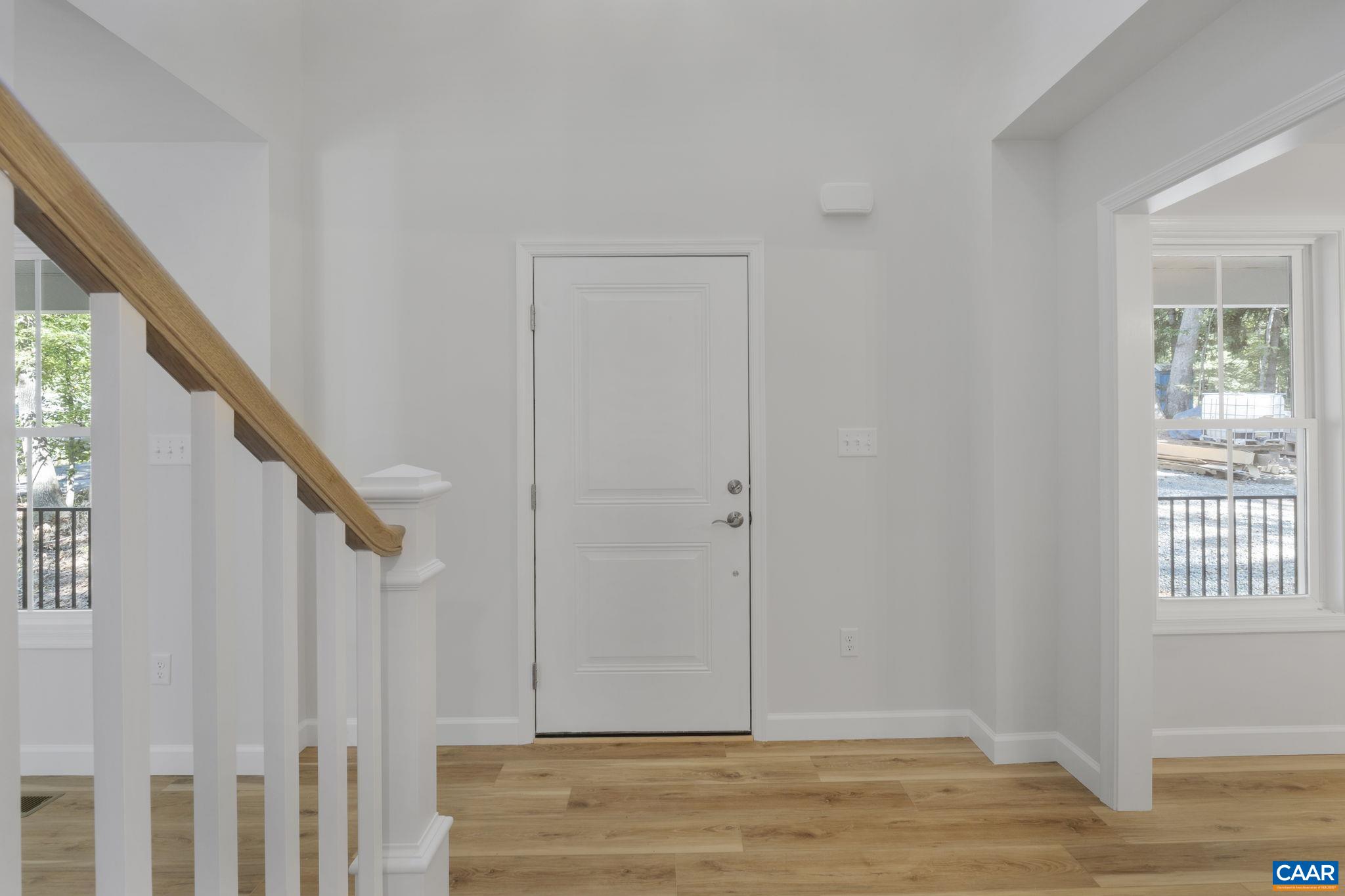 6 Condor Road Palmyra, VA 22963 - Photo 22 of 65 a view of entryway with wooden floor and stairs