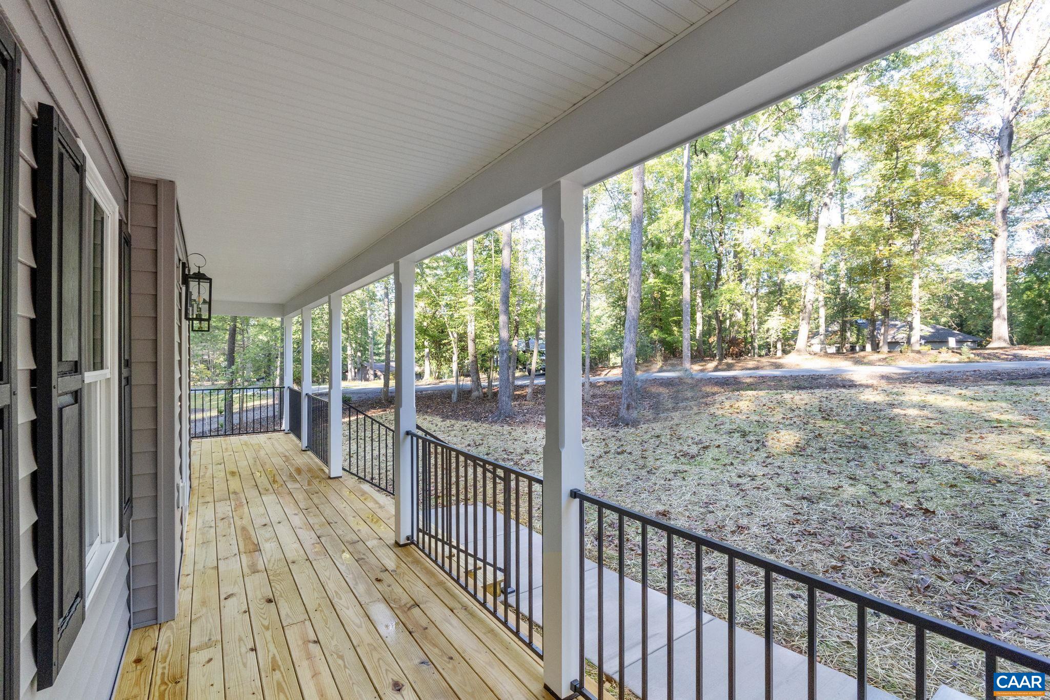 6 Condor Road Palmyra, VA 22963 - Photo 3 of 65 a view of a porch and wooden floor