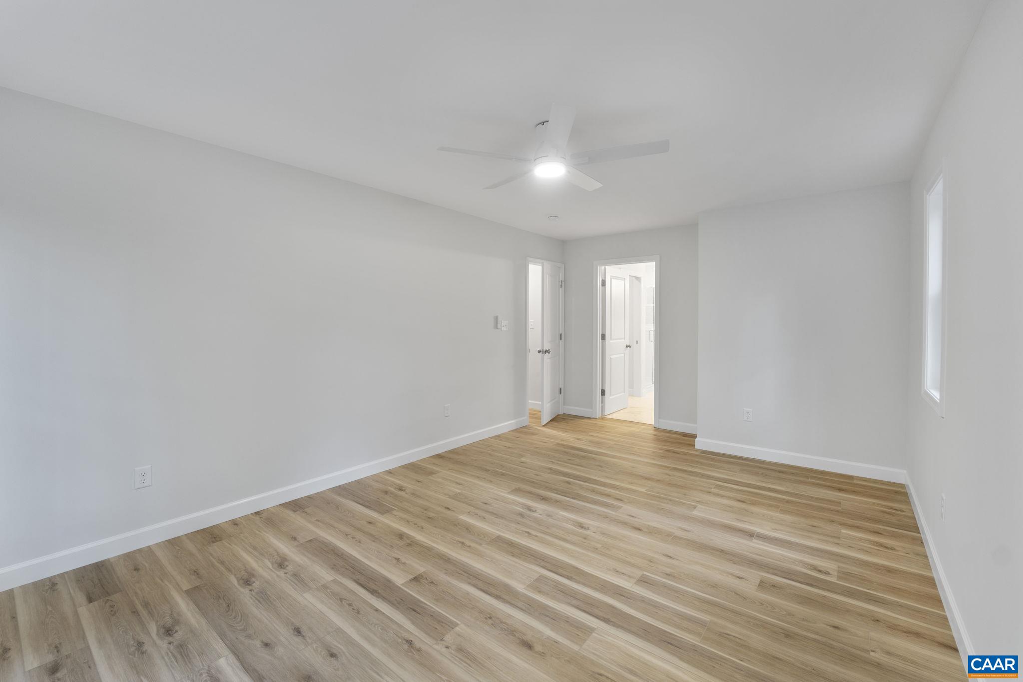 6 Condor Road Palmyra, VA 22963 - Photo 33 of 65 a view of an empty room with wooden floor