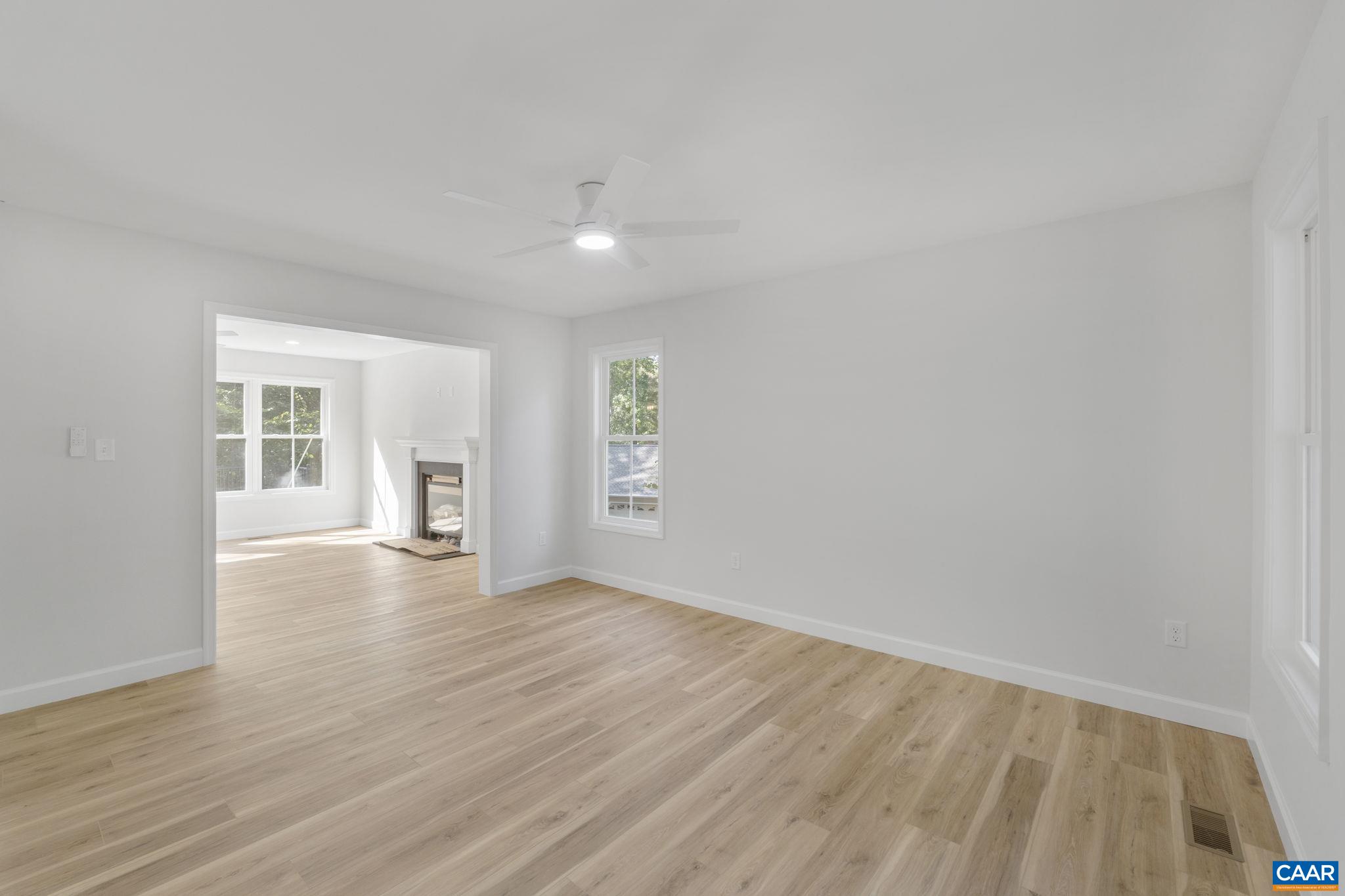 6 Condor Road Palmyra, VA 22963 - Photo 43 of 65 wooden floor in an empty room with a window