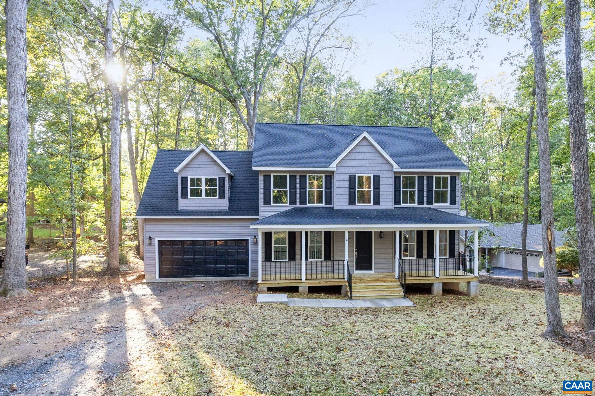 6 Condor Road Palmyra, VA 22963 - Photo 51 of 65 a house that has a tree in front of it