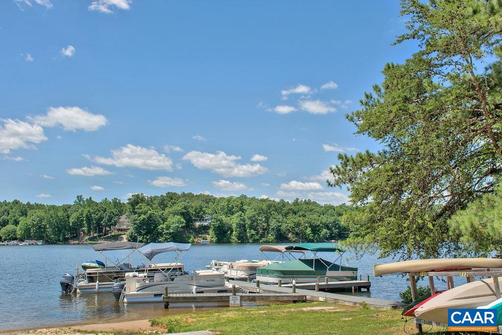 6 Condor Road Palmyra, VA 22963 - Photo 57 of 65 a view of swimming pool with outdoor seating and lake view