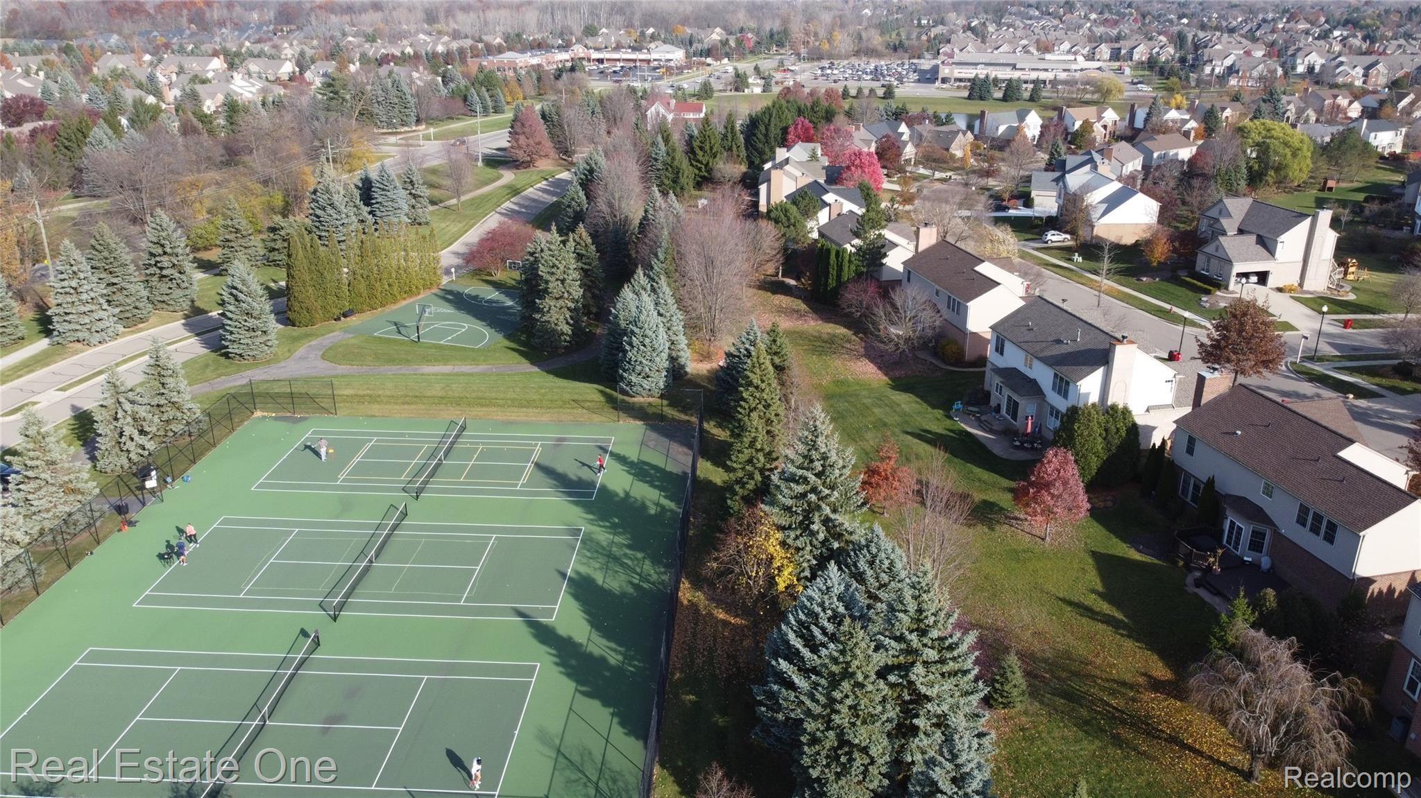 1762 Ring Neck Drive Rochester, MI 48307 - Photo 41 of 48 drone shot tennis courts & basketball court