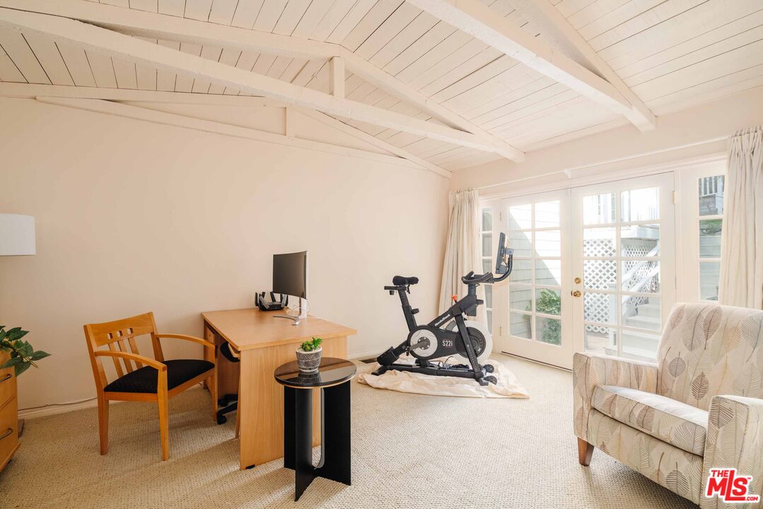21580 Encina Road Topanga, CA 90290 - Photo 21 of 38 a view of a workspace with furniture and a window
