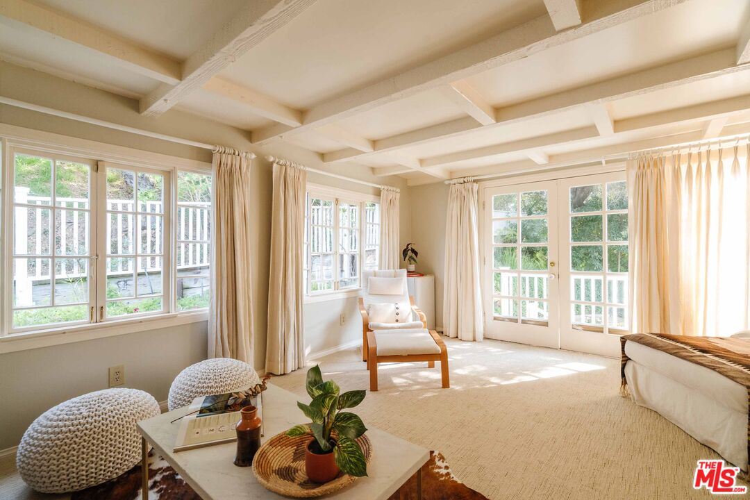 21580 Encina Road Topanga, CA 90290 - Photo 35 of 38 a living room with furniture and a large window