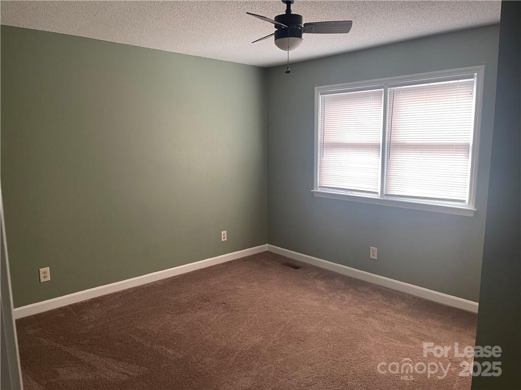 1425 20th Avenue Northeast Hickory, NC 28601 - Photo 11 of 22 an empty room with a window
