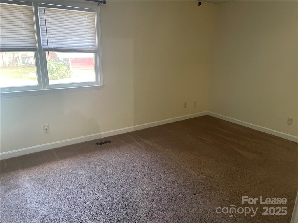1425 20th Avenue Northeast Hickory, NC 28601 - Photo 16 of 22 an empty room with a window