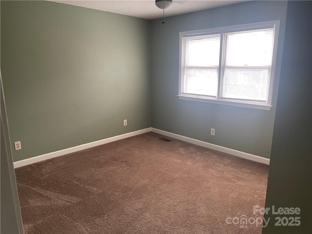 1425 20th Avenue Northeast Hickory, NC 28601 - Photo 10 of 22 an empty room with a window