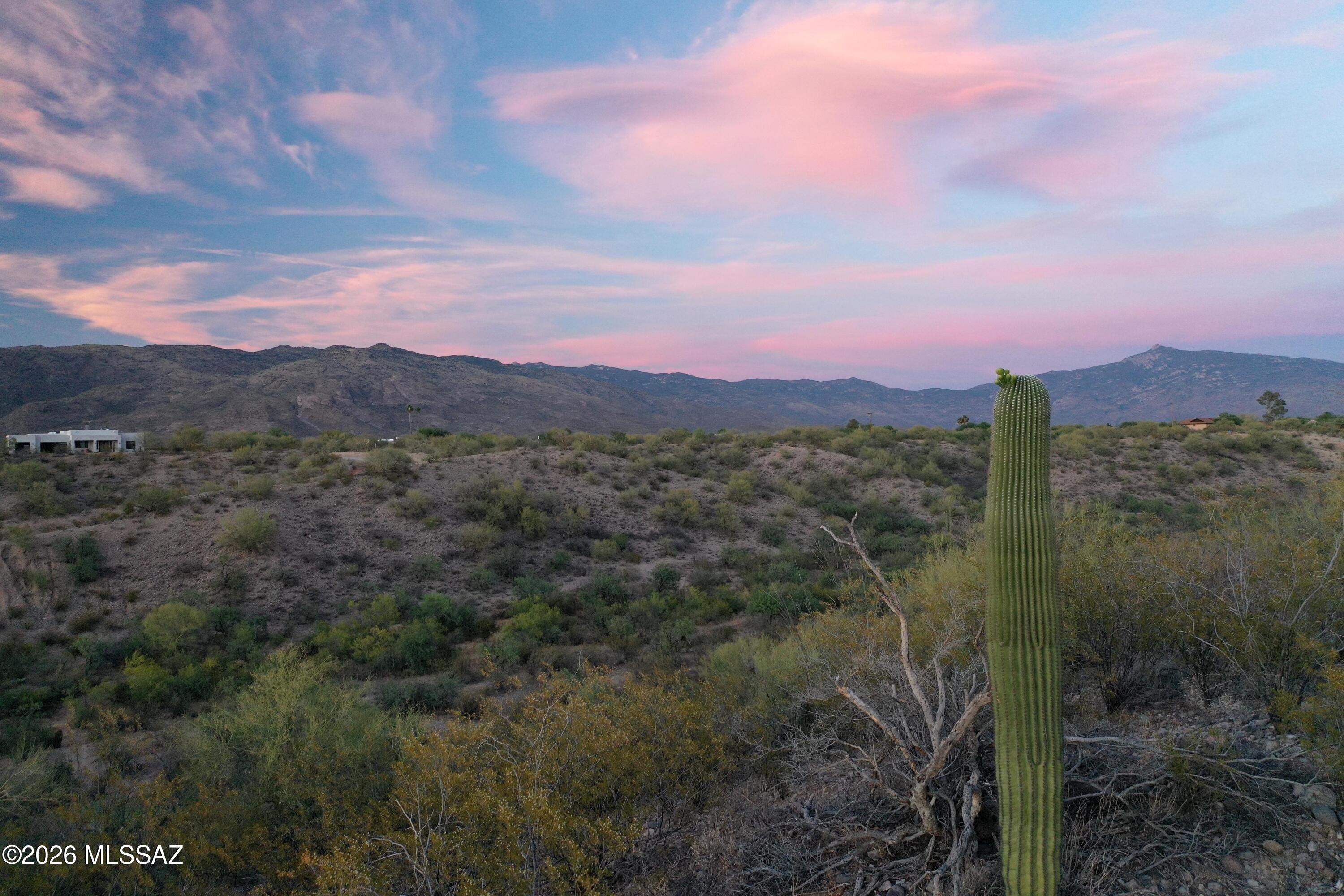 Tdb East Los Reales Road, Unit 20581009D Tucson, AZ 85747 - Photo 10 of 16 a view of a town with mountains in the background