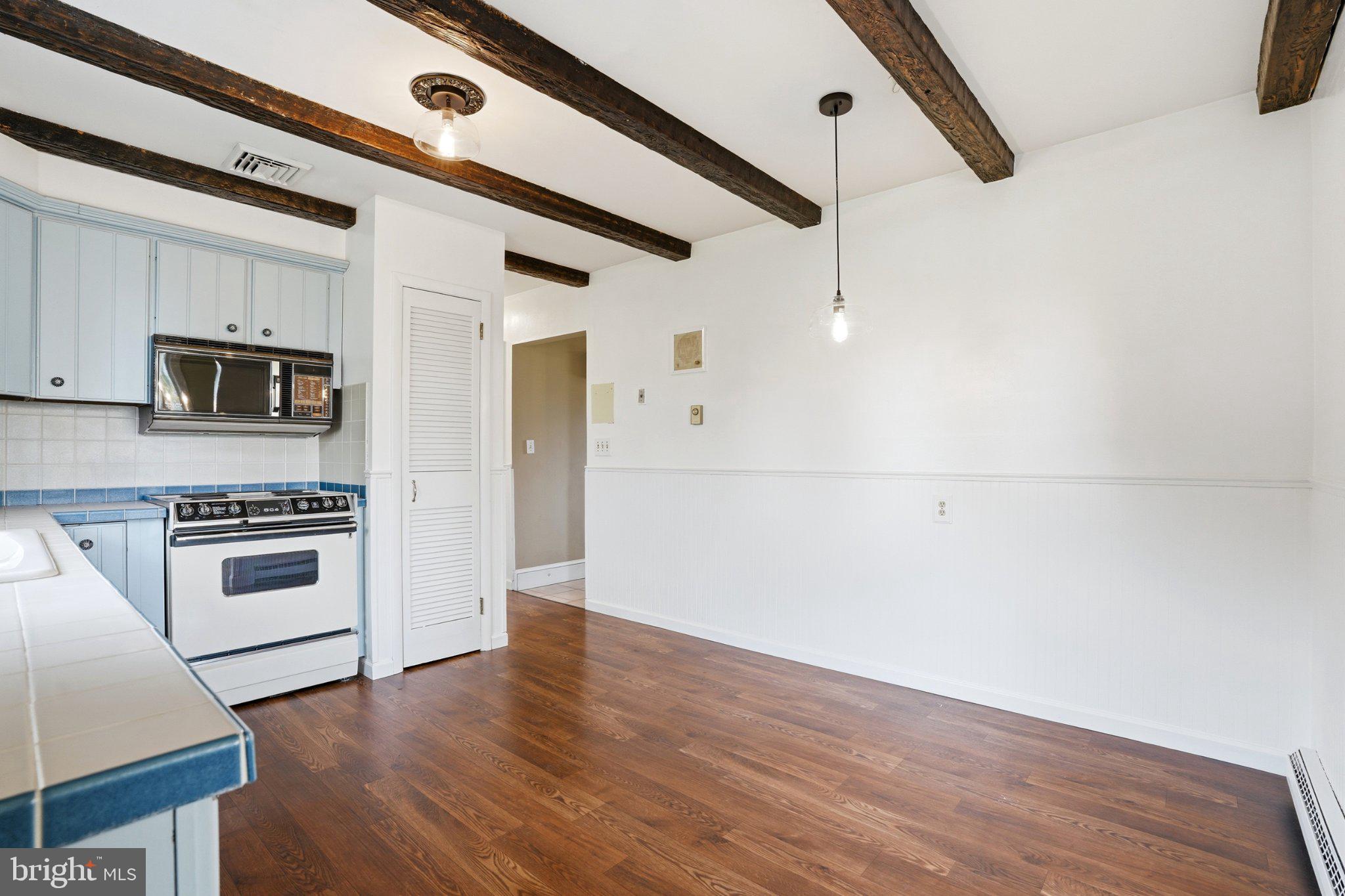 684 Hunsicker Road Telford, PA 18969 - Photo 17 of 89 Charming kitchen with rustic beams.