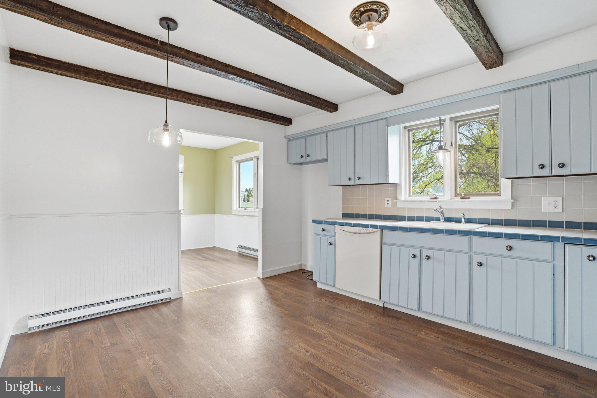 684 Hunsicker Road Telford, PA 18969 - Photo 18 of 89 Charming kitchen with rustic beams.