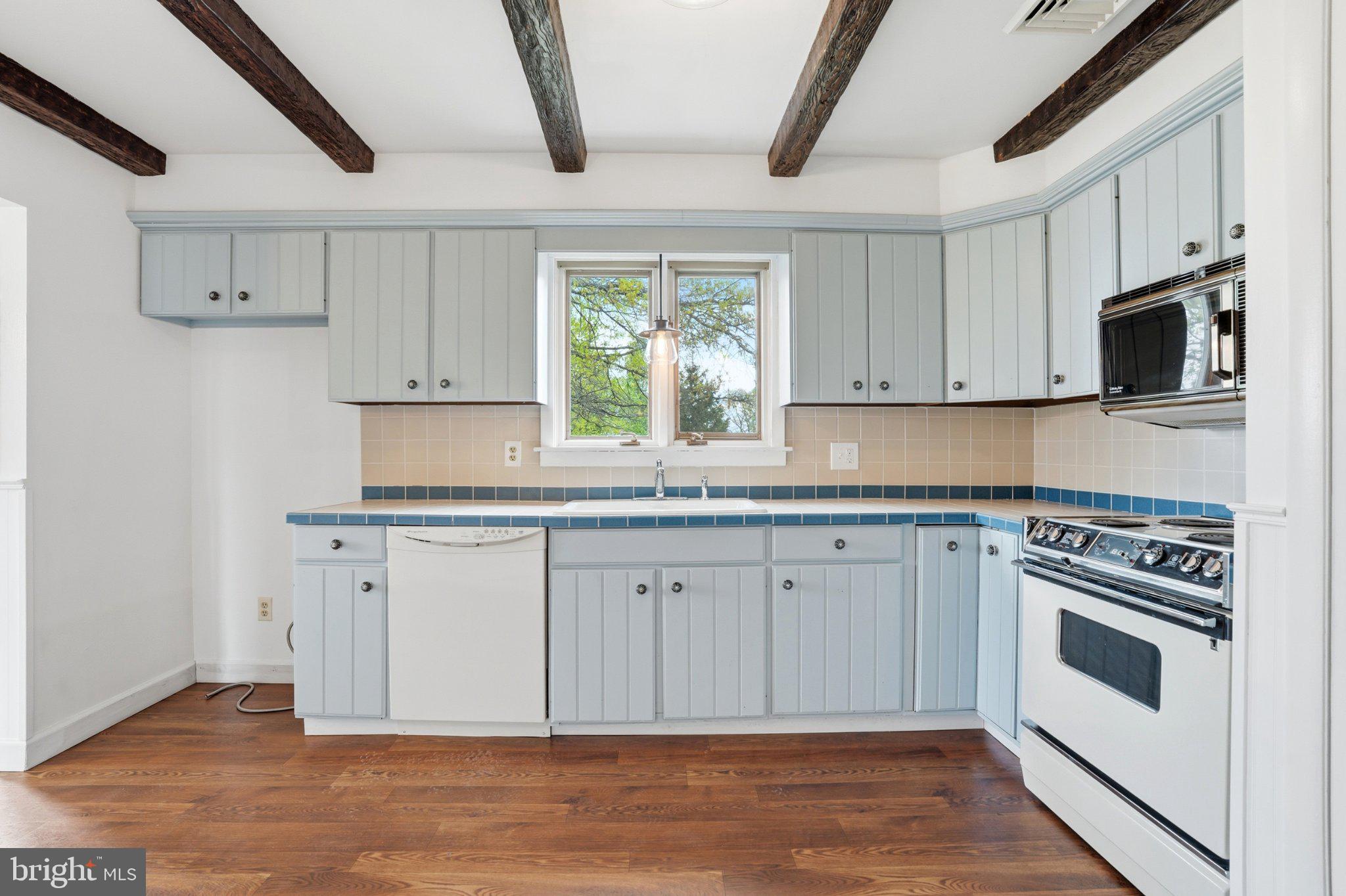 684 Hunsicker Road Telford, PA 18969 - Photo 19 of 89 Charming kitchen with rustic beams.