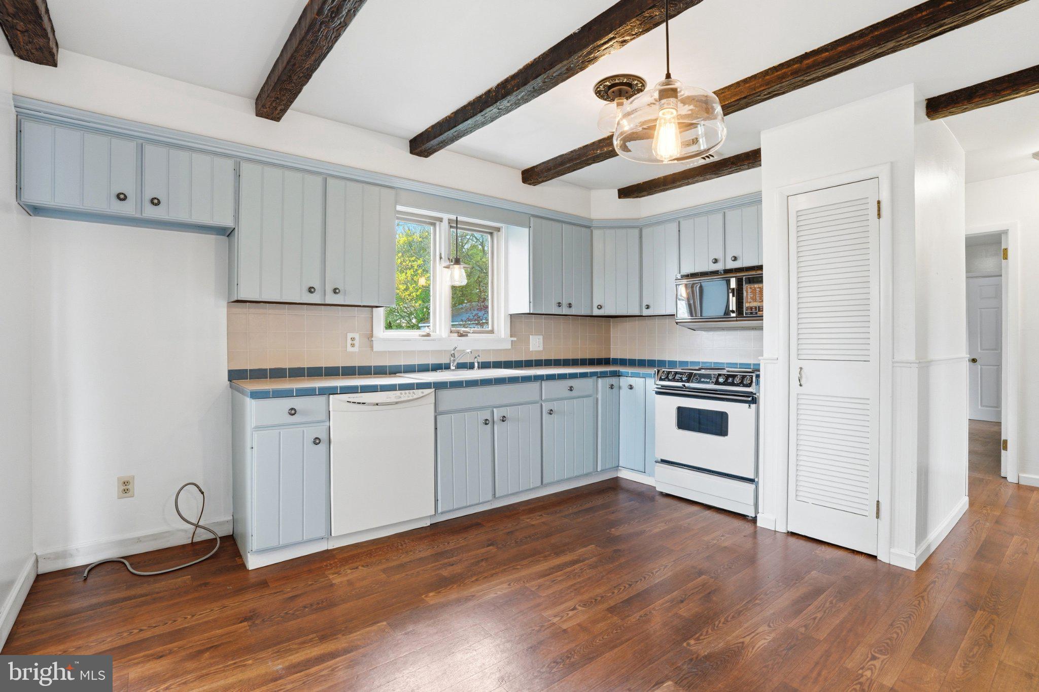 684 Hunsicker Road Telford, PA 18969 - Photo 20 of 89 Charming kitchen with rustic beams.