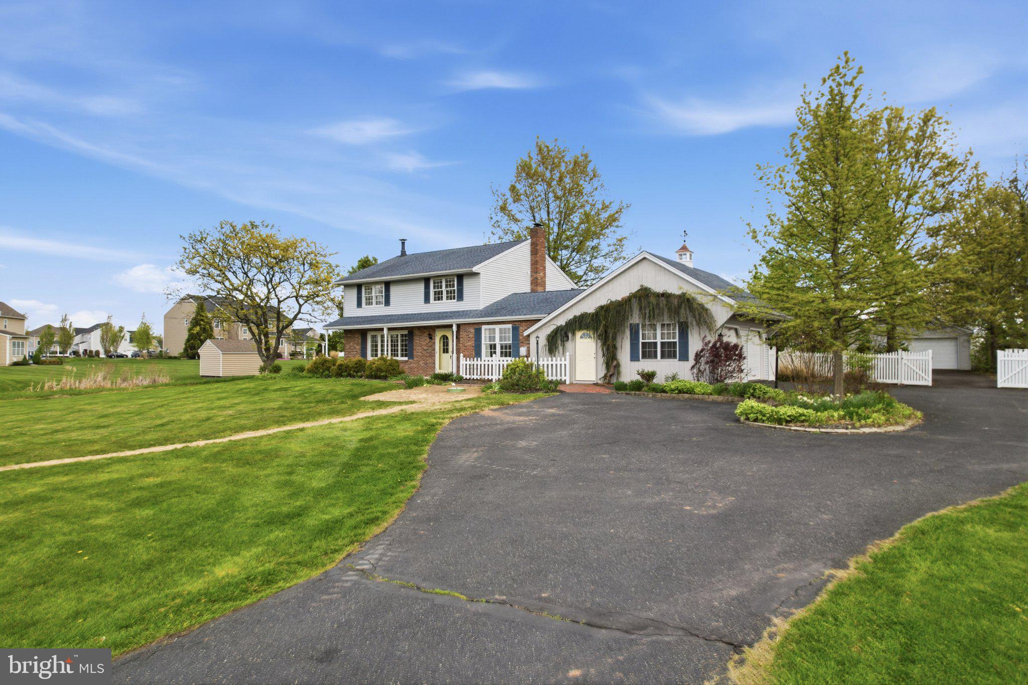 684 Hunsicker Road Telford, PA 18969 - Photo 2 of 89 Charming home with lush green surroundings.