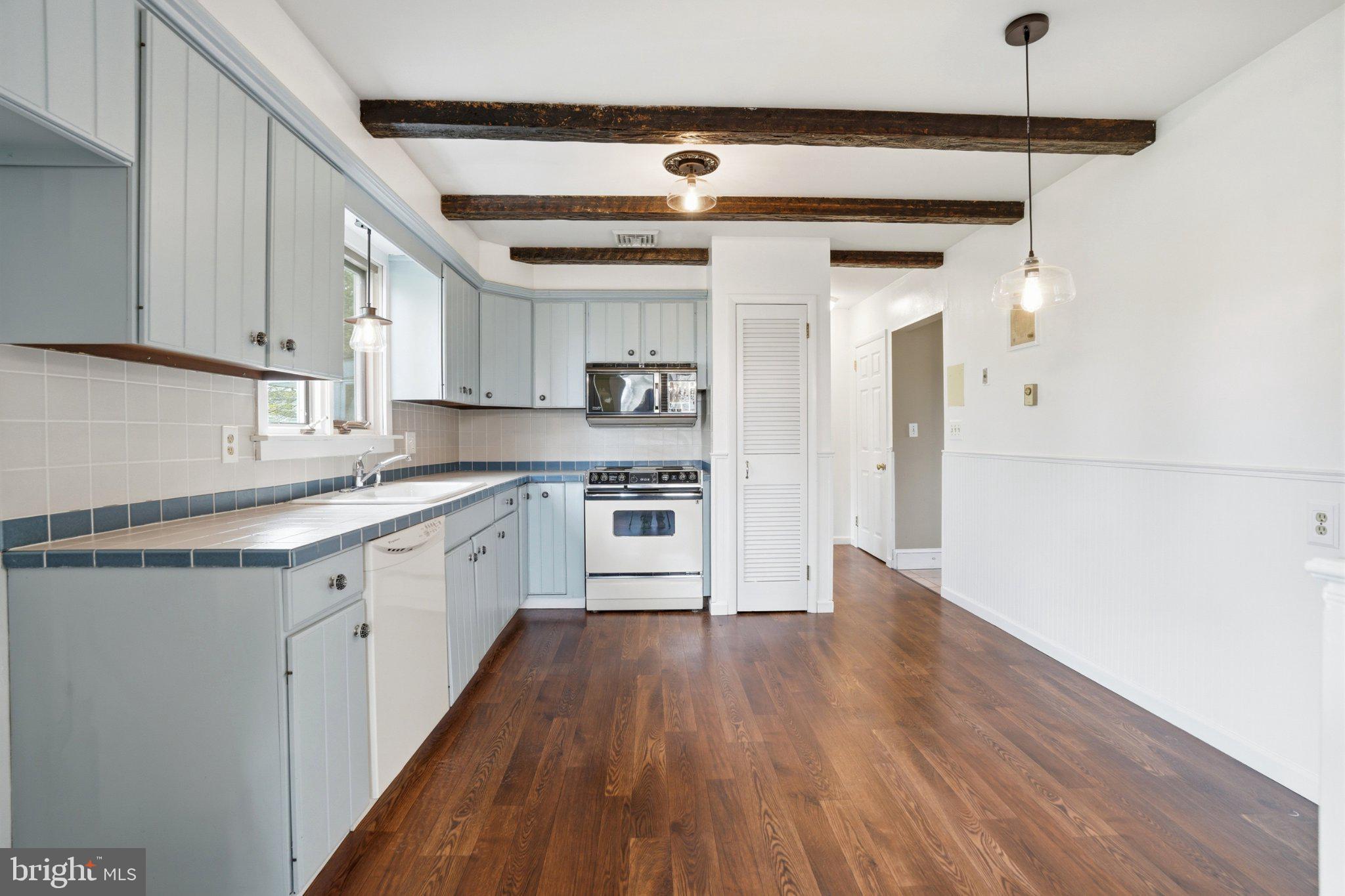 684 Hunsicker Road Telford, PA 18969 - Photo 21 of 89 Charming kitchen with rustic beams.
