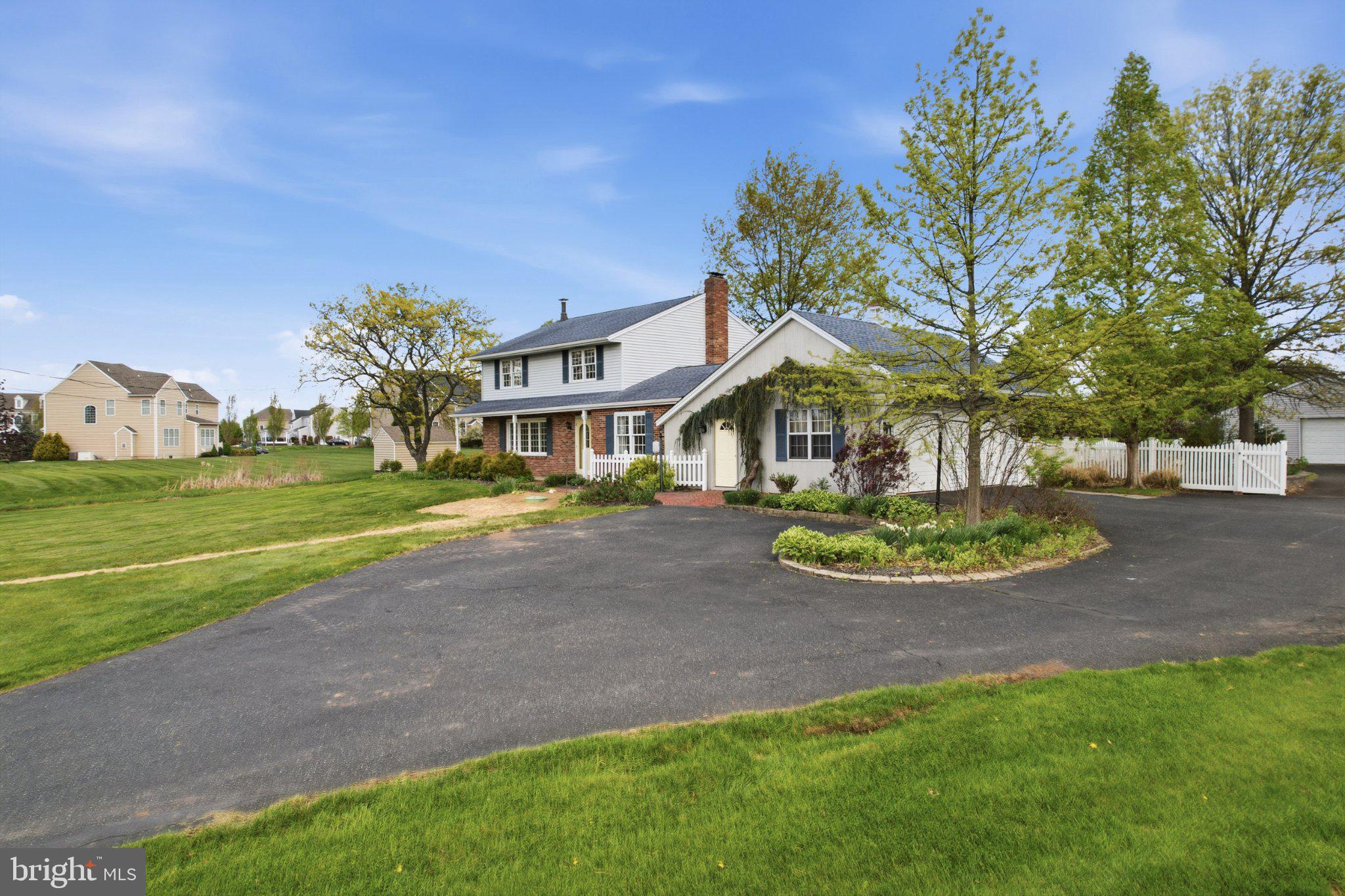 684 Hunsicker Road Telford, PA 18969 - Photo 6 of 89 Charming home with lush green surroundings.
