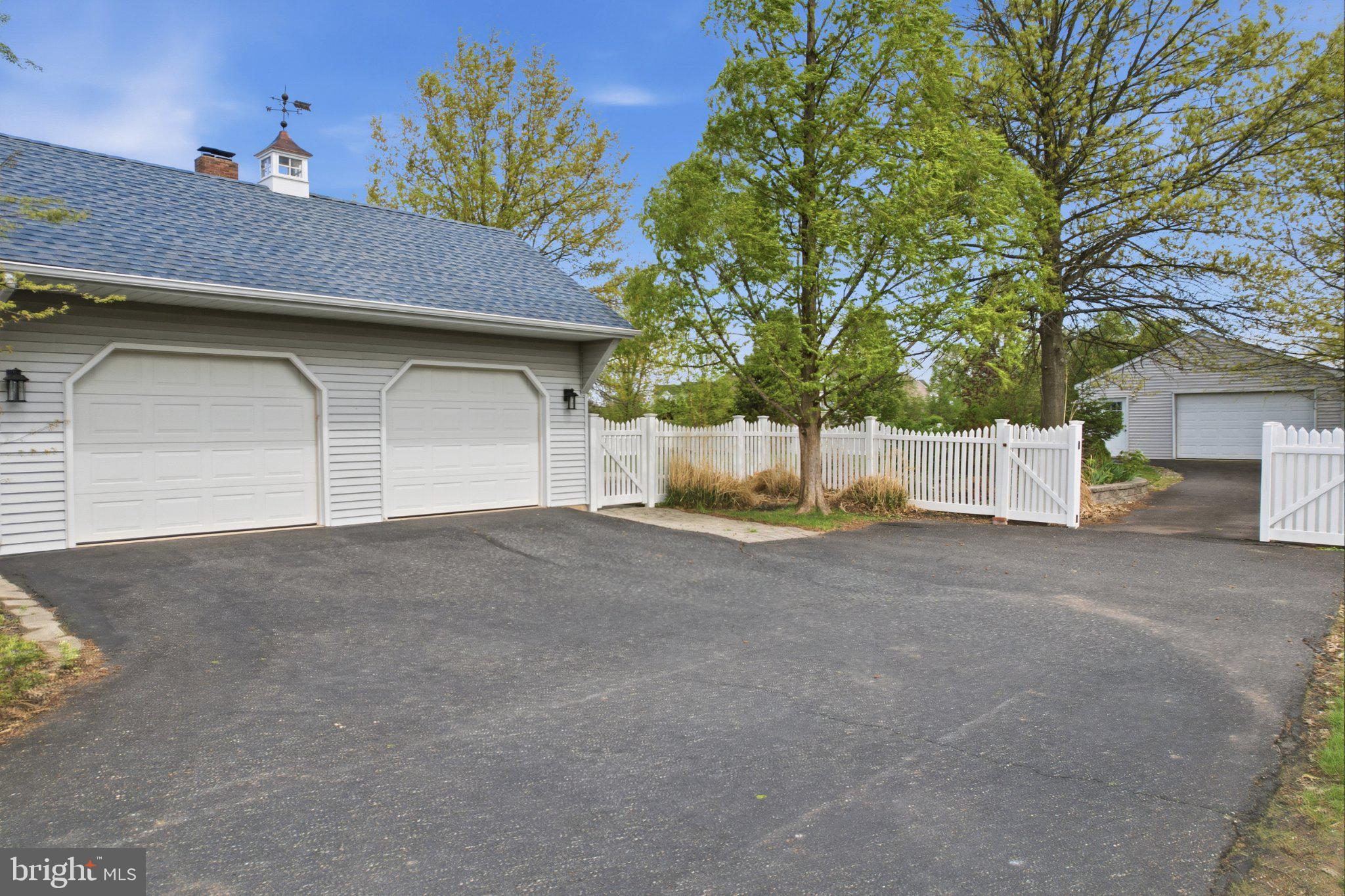 684 Hunsicker Road Telford, PA 18969 - Photo 8 of 89 Charming driveway with white picket fence.