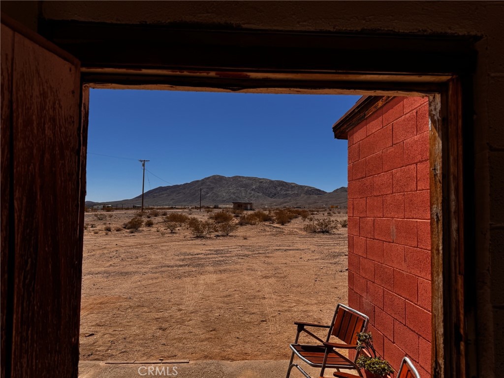6615 Thunder Road Twentynine Palms, CA 92277 - Photo 3 of 14 a view of balcony and chair