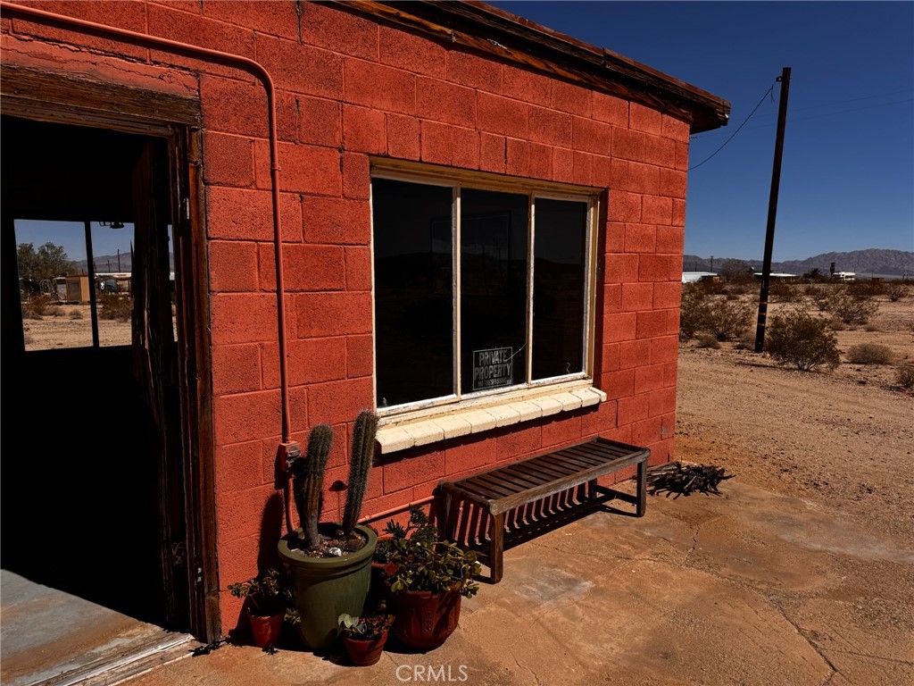 6615 Thunder Road Twentynine Palms, CA 92277 - Photo 5 of 14 a view of a house with a window