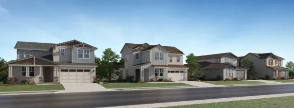a front view of residential houses with yard