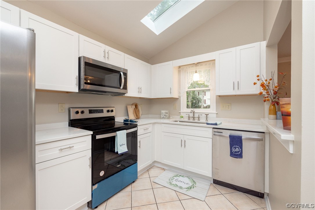 2406 Arrowood Road Midlothian, VA 23112 - Photo 12 of 39 a kitchen with stainless steel appliances granite countertop a stove a sink and a microwave