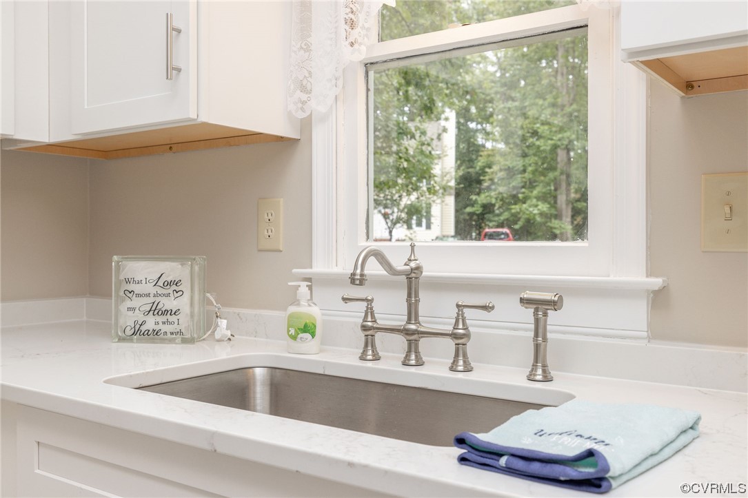 2406 Arrowood Road Midlothian, VA 23112 - Photo 15 of 39 a close view of sink and tap