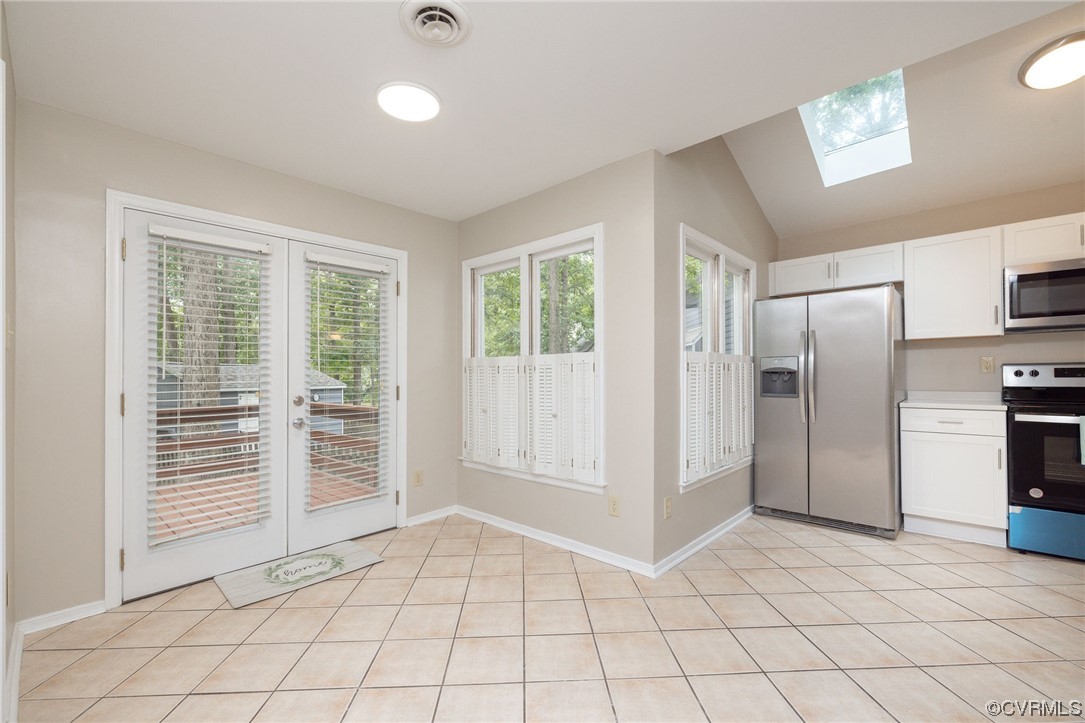 2406 Arrowood Road Midlothian, VA 23112 - Photo 18 of 39 a view of a kitchen with a sink and a refrigerator