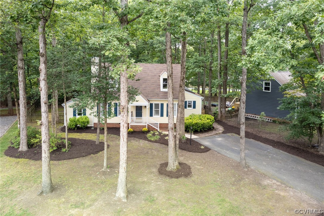 2406 Arrowood Road Midlothian, VA 23112 - Photo 2 of 39 a view of a house with a patio