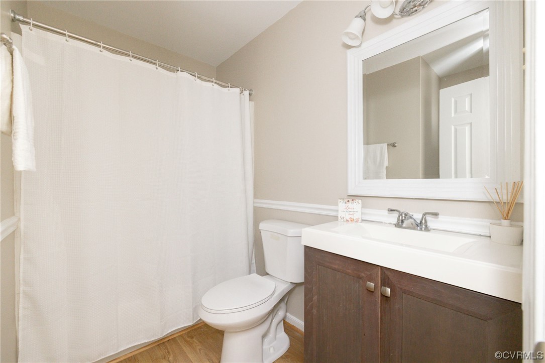 2406 Arrowood Road Midlothian, VA 23112 - Photo 21 of 39 a bathroom with a sink and a toilet