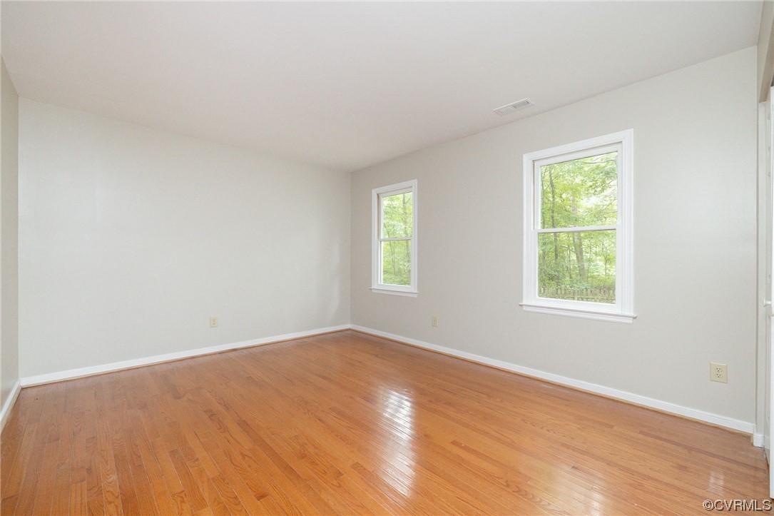 2406 Arrowood Road Midlothian, VA 23112 - Photo 23 of 39 an empty room with windows