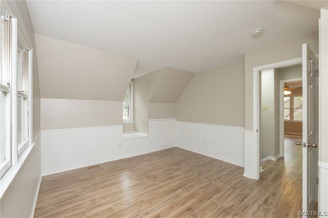 2406 Arrowood Road Midlothian, VA 23112 - Photo 27 of 39 an empty room with wooden floor and windows