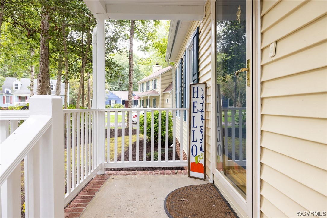 2406 Arrowood Road Midlothian, VA 23112 - Photo 3 of 39 a view of a balcony with a floor to ceiling window