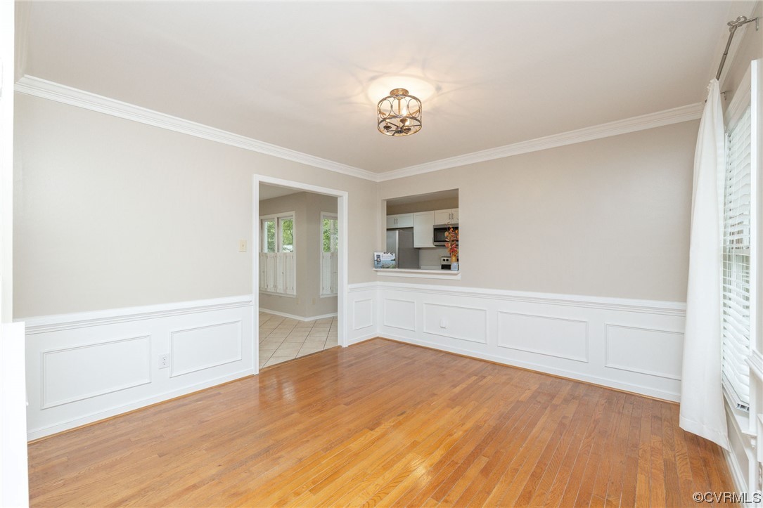 2406 Arrowood Road Midlothian, VA 23112 - Photo 9 of 39 a view of empty room with wooden floor and fan