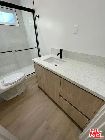 a bathroom with a sink and a toilet