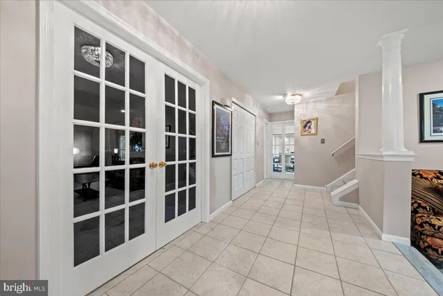 a view of empty room with windows