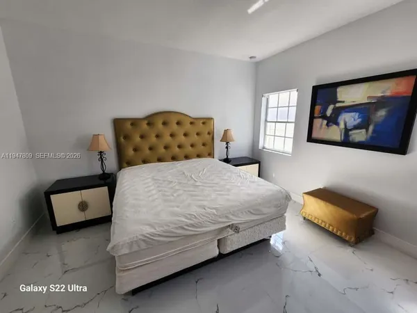 a bathroom with a sink and toilet