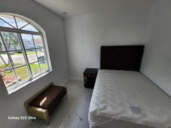 a bathroom with a sink and toilet