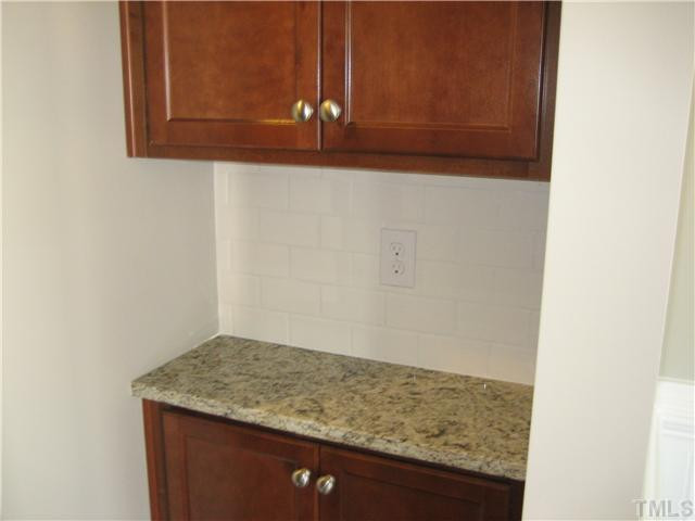2204 Lower Lake Road Wake Forest, NC 27587 - Photo 5 of 24 Butler's Pantry off Formal Dining. Included granite top and tile Backsplash