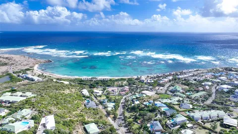a view of a city with an ocean view