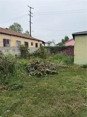 a aerial view of a house with a yard